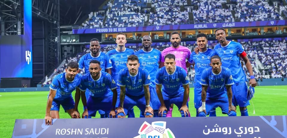 Al Hilal team posing for a photo before match
