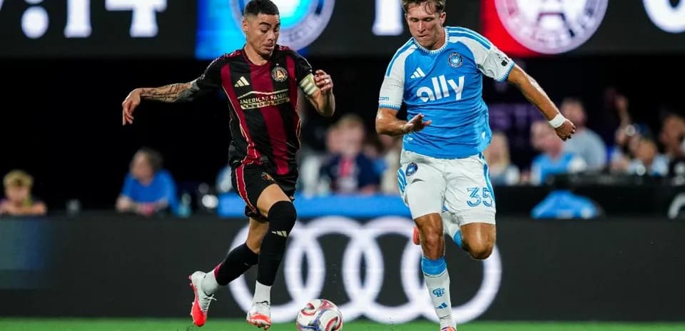 Atlanta United FC player dribbling against Charlotte