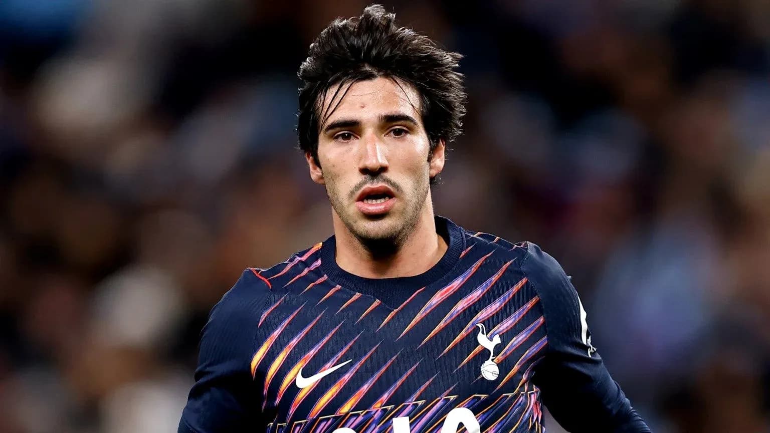Player in Tottenham kit during match action