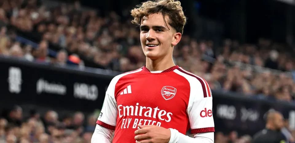 Arsenal player smiling during match celebration