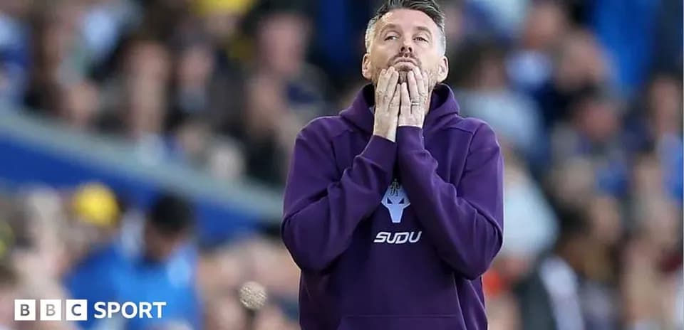 Coach showing concern during a match