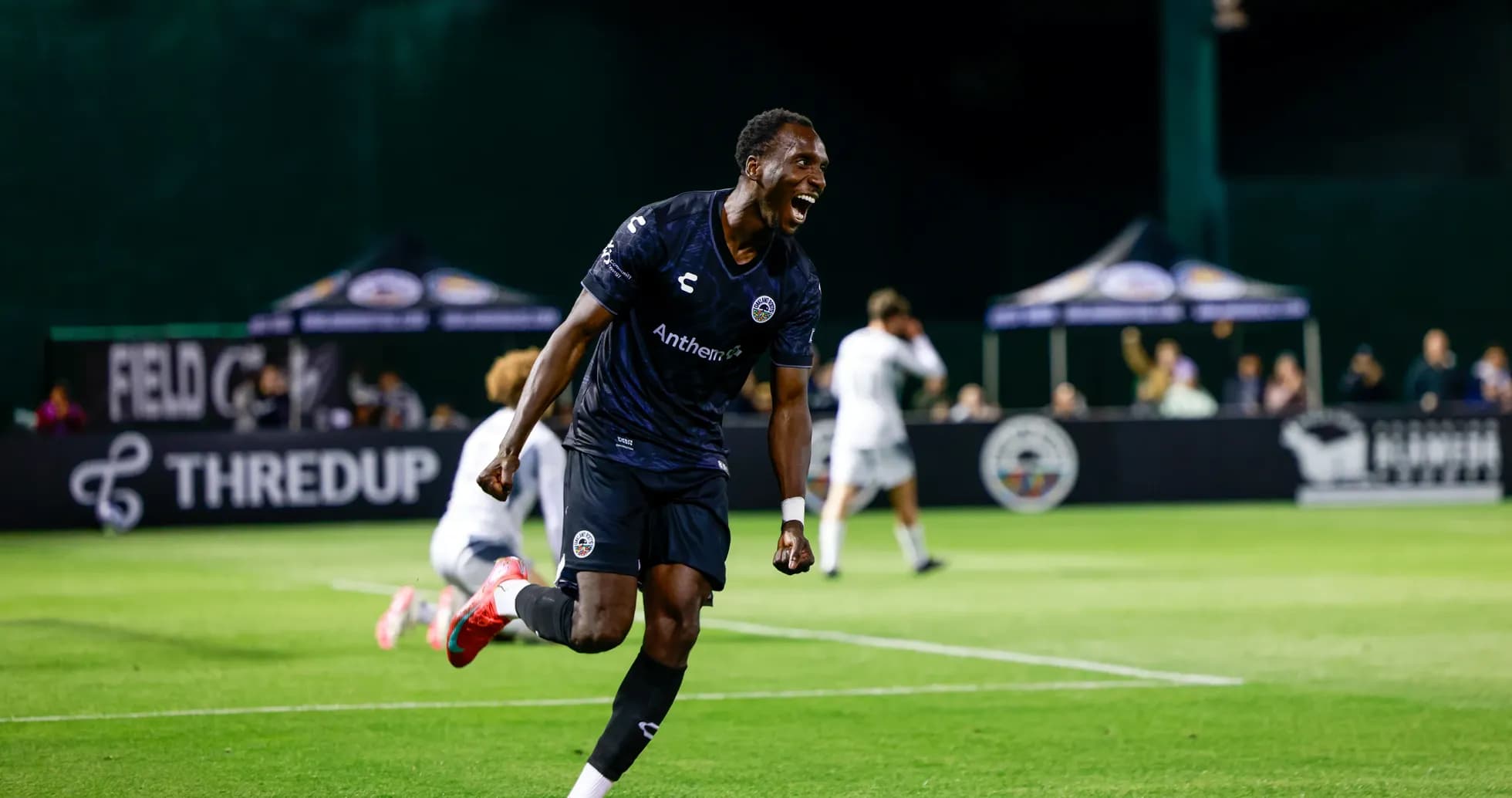 Player celebrating a goal during USL match