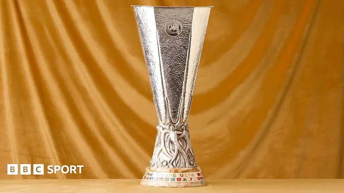 UEFA Europa League trophy displayed on golden background