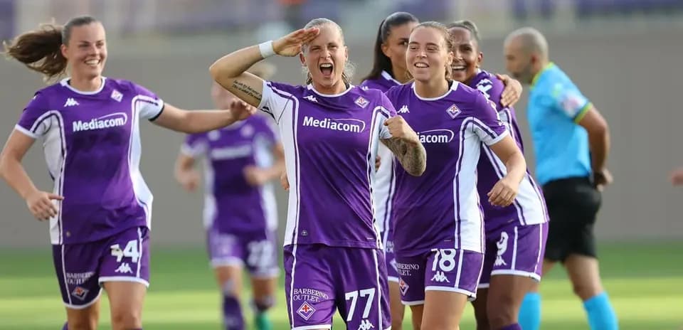 Fiorentina players celebrating during a match