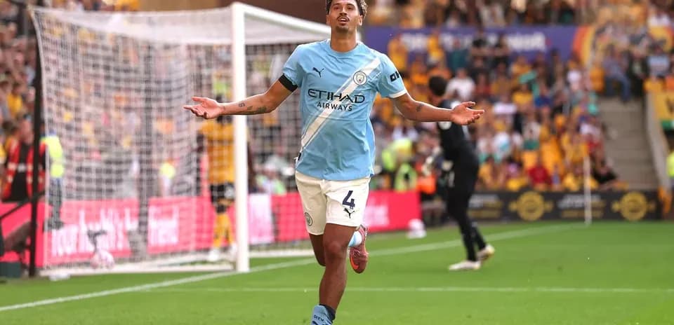 Player celebrating after scoring a goal during match