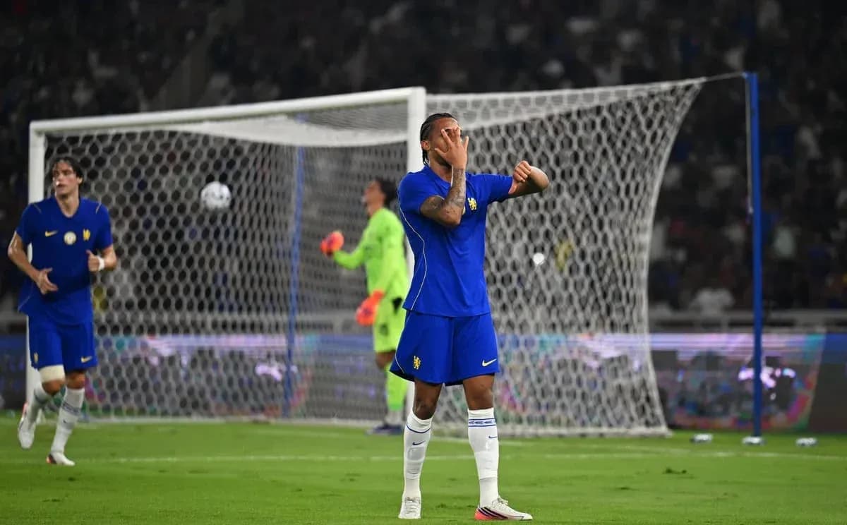 Player reacting during a soccer match with goalpost in background