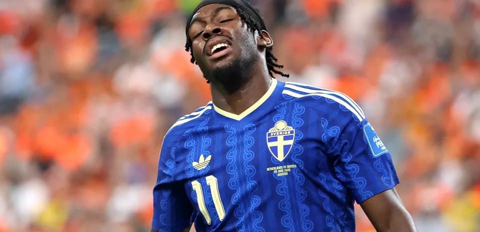 Player in blue jersey reacting during match