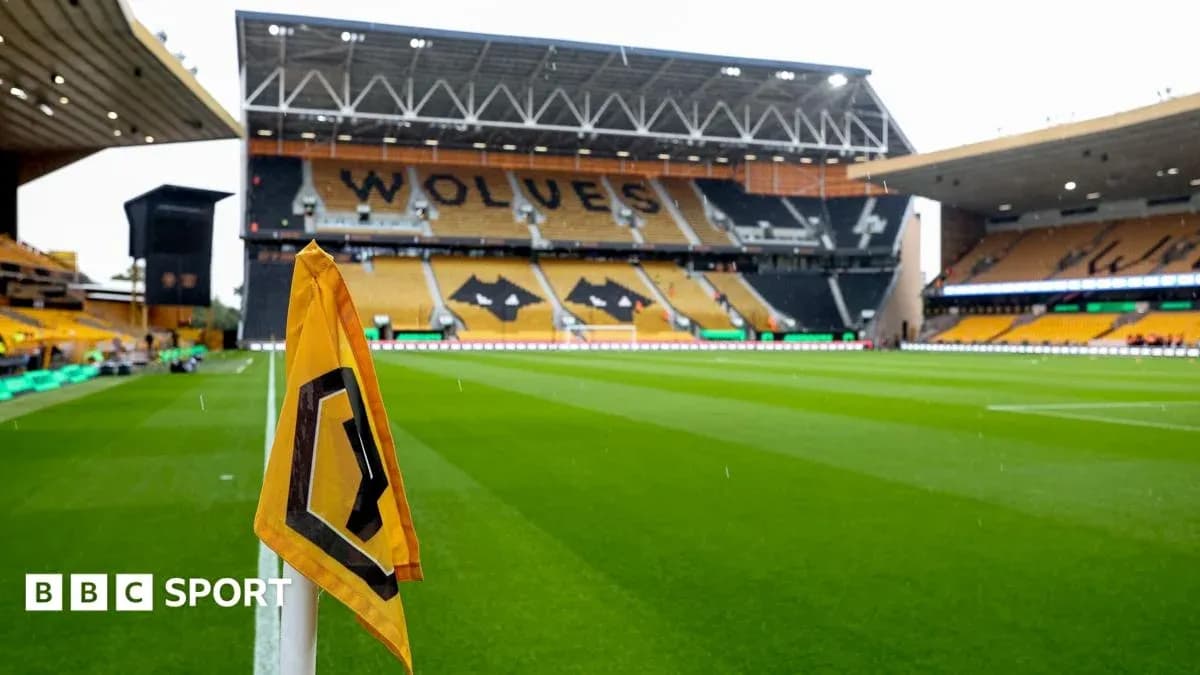 Corner flag in front of empty stadium seating