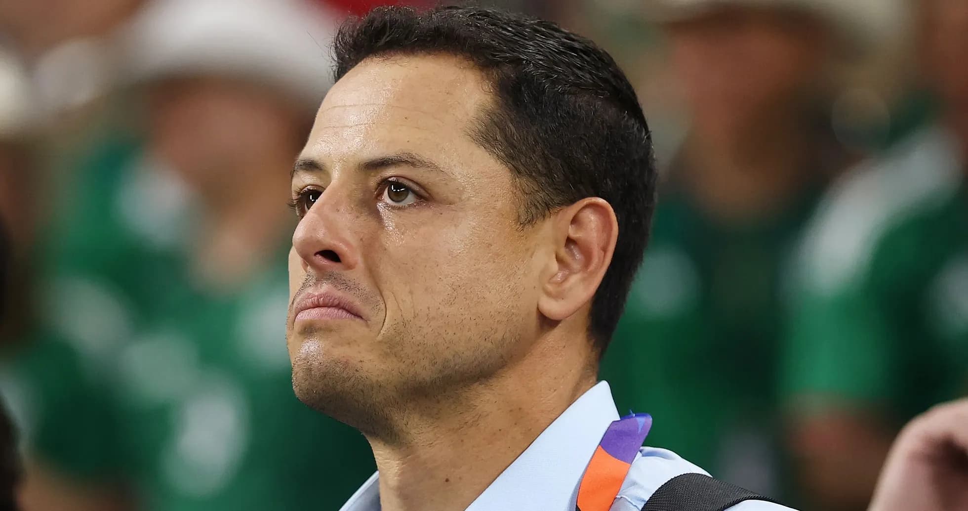 Man with tearful expression during event