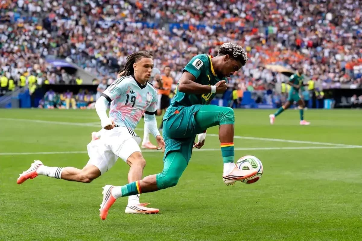Player dribbling the ball during a football match