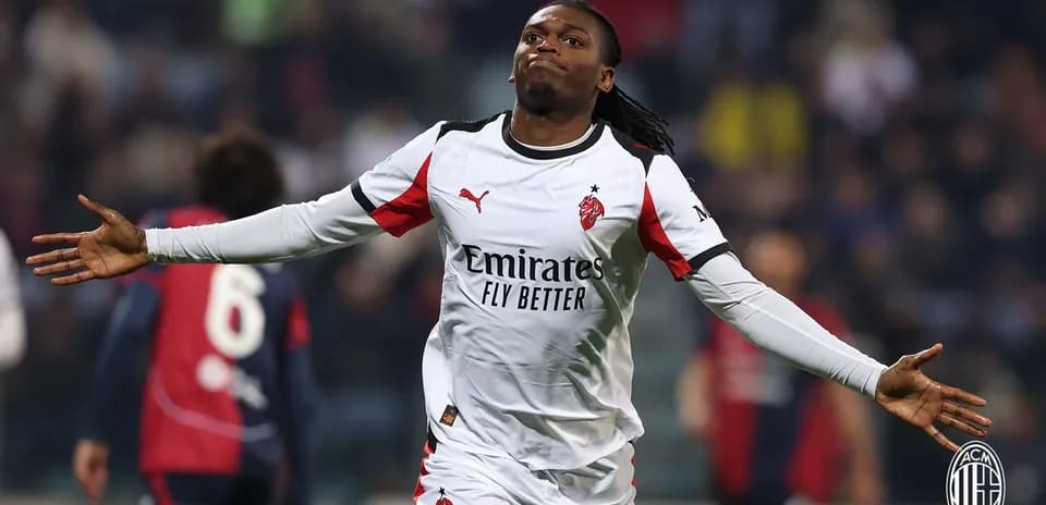 Player celebrating after scoring goal for AC Milan