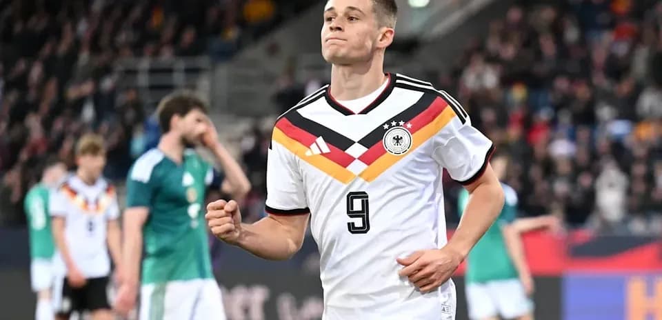Player celebrating after scoring for Germany team