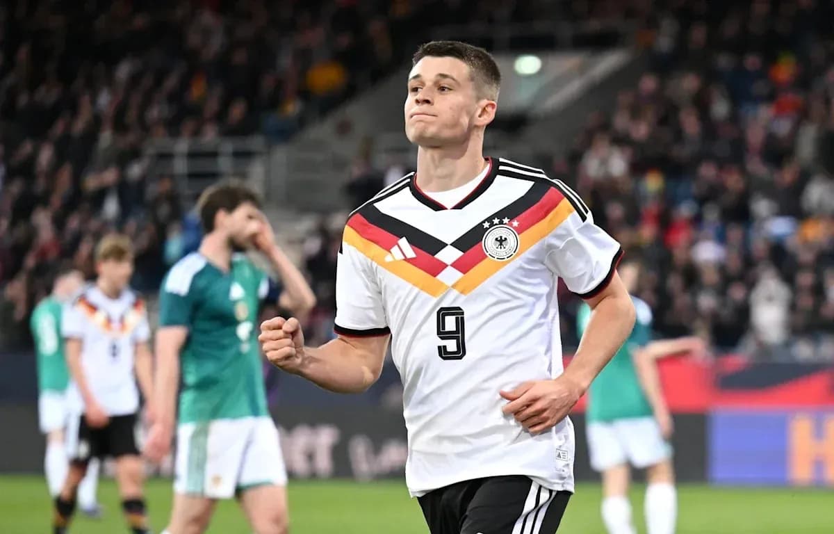 Player celebrating after scoring for Germany team