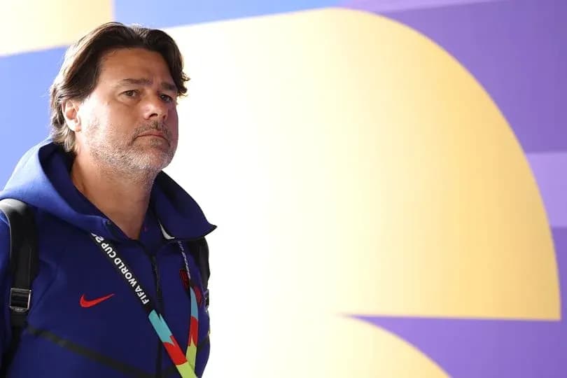 Coach walking in with FIFA World Cup credentials