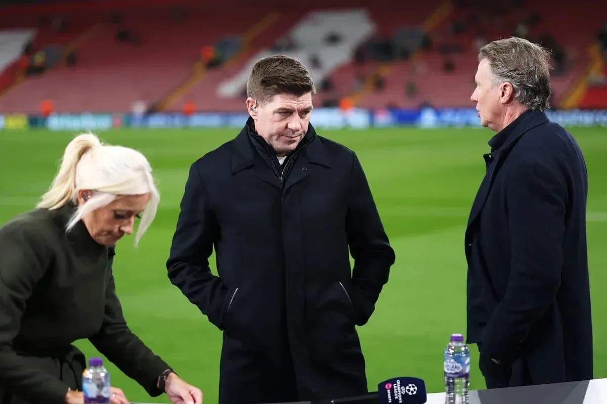 Three analysts discussing on the pitch before match