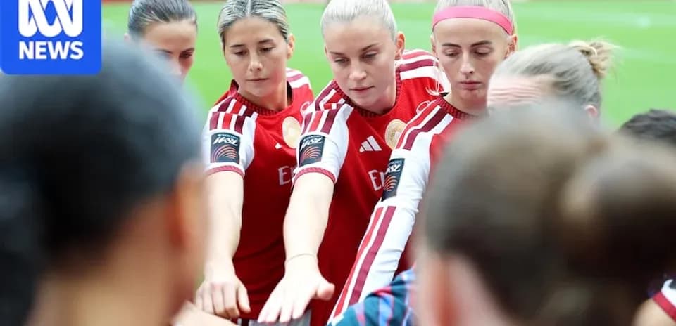 Female players in huddle before a match