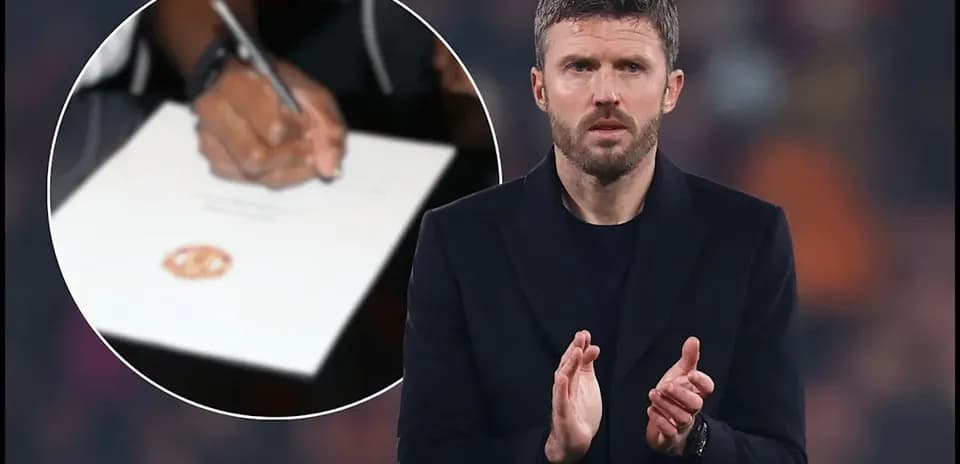 Michael Carrick applauding with signing document in background