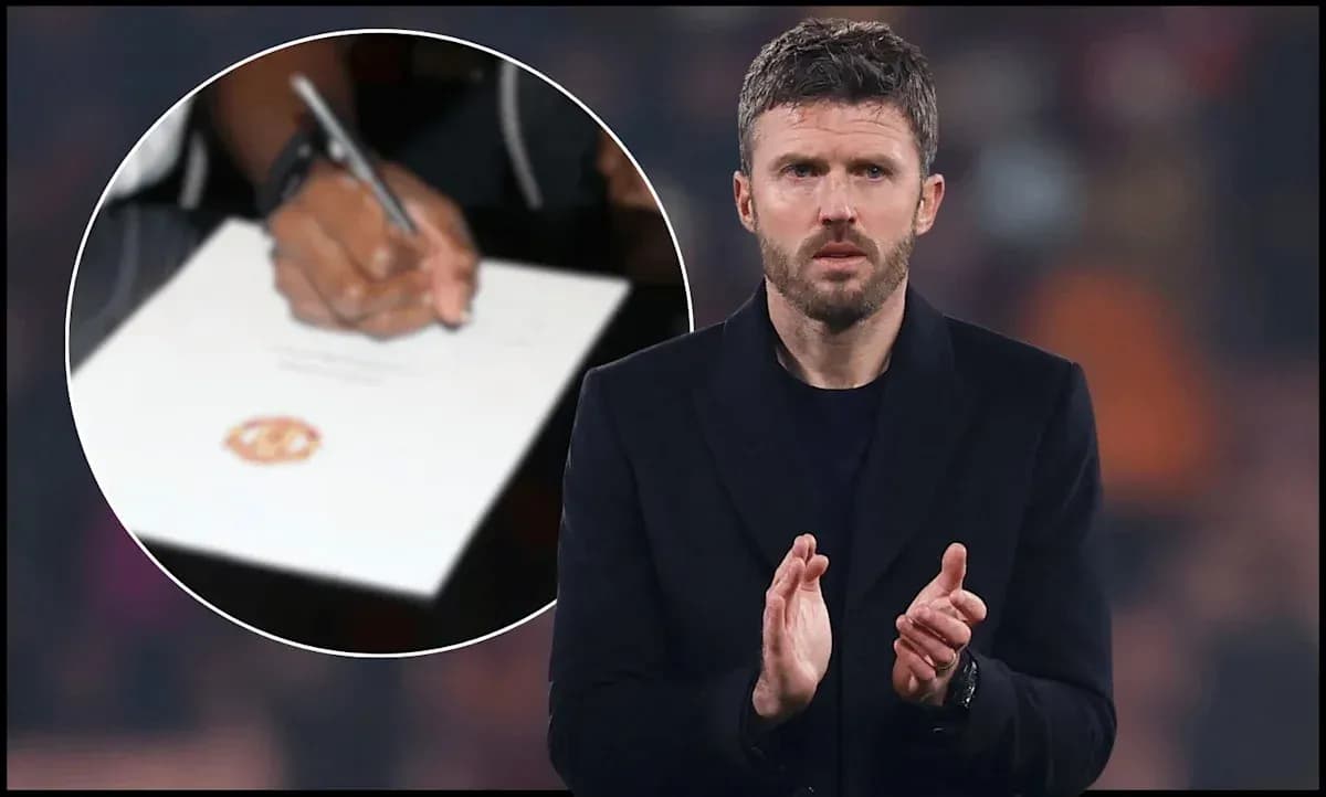 Michael Carrick applauding with signing document in background