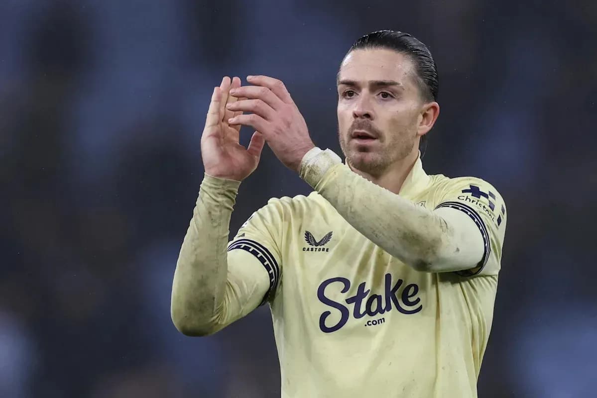 Player applauding fans wearing a yellow jersey