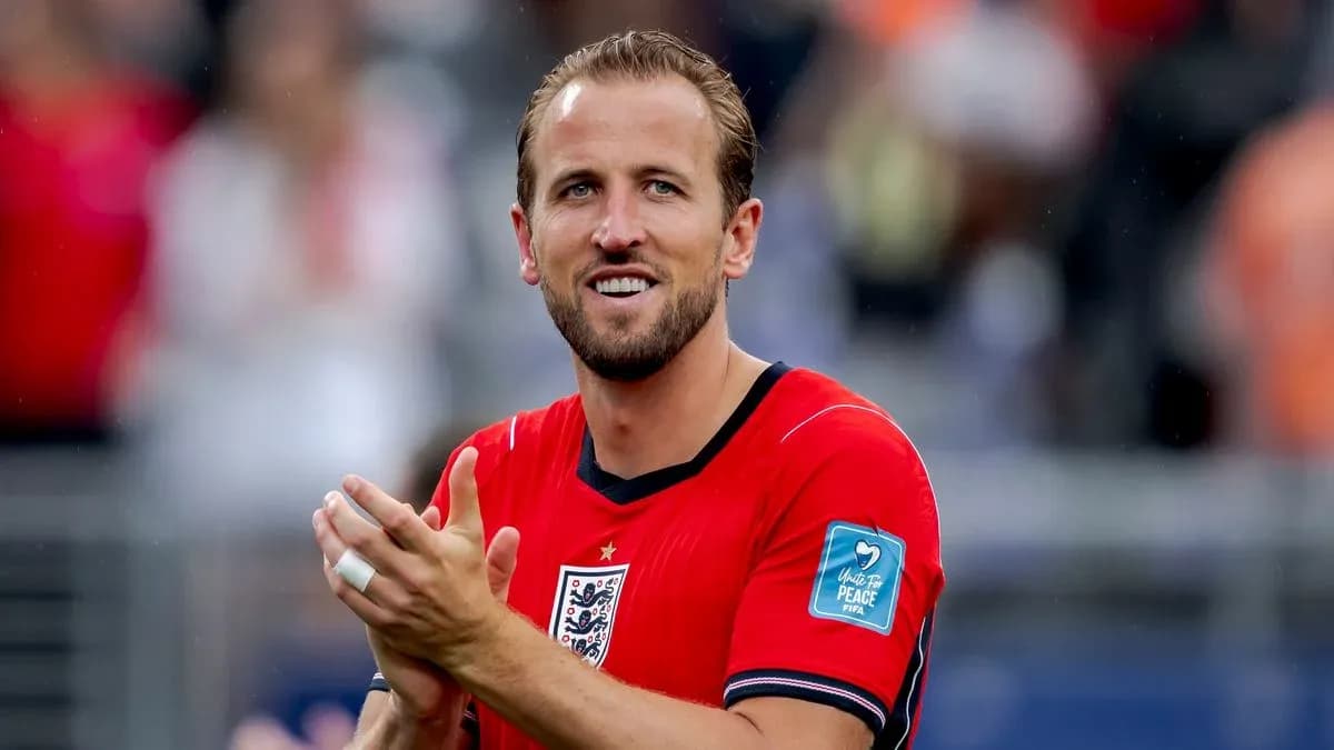 Player applauding while wearing England jersey