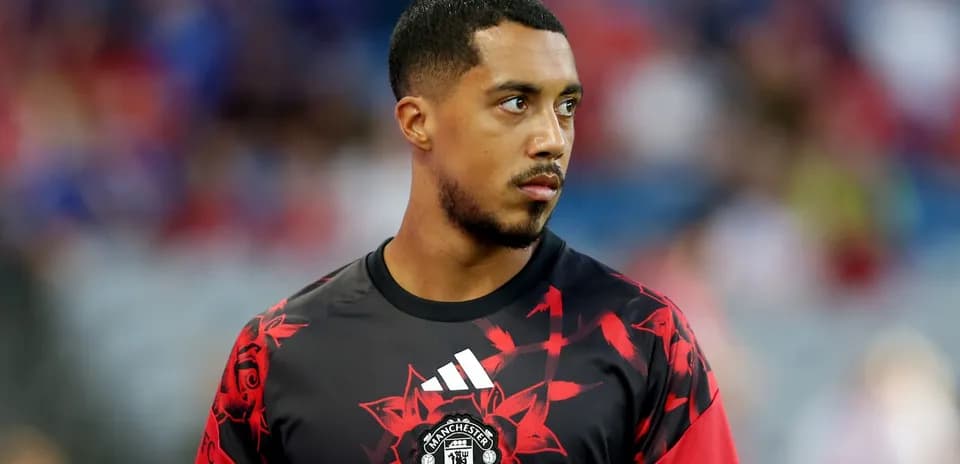 Player wearing Manchester United training kit on field