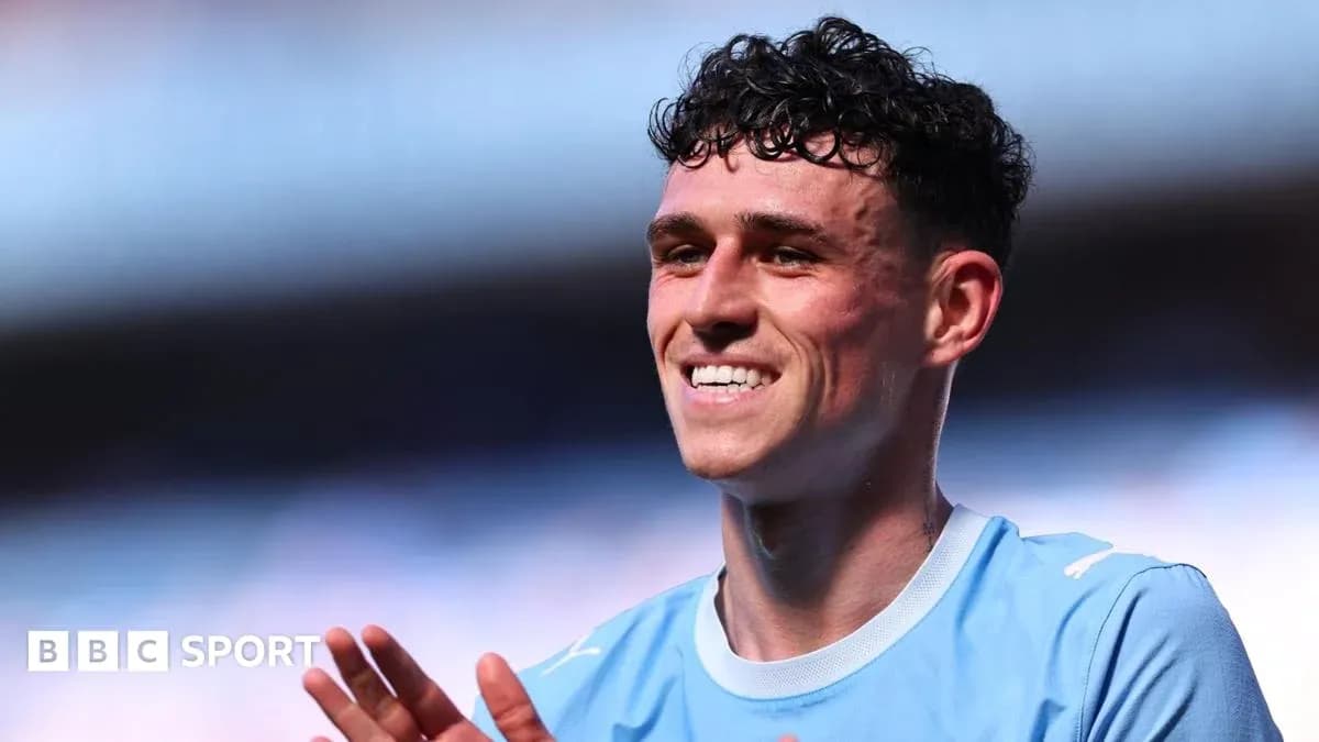 Player smiling and applauding fans after match