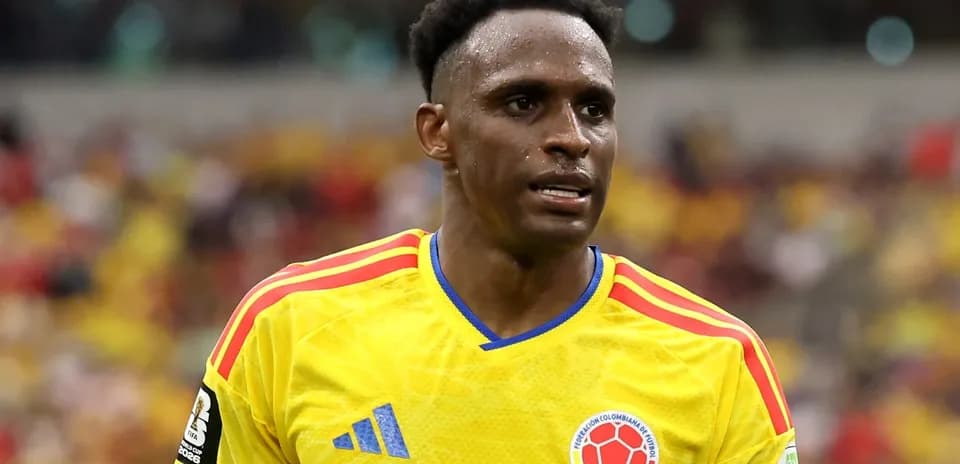 Player in yellow Colombia jersey during match