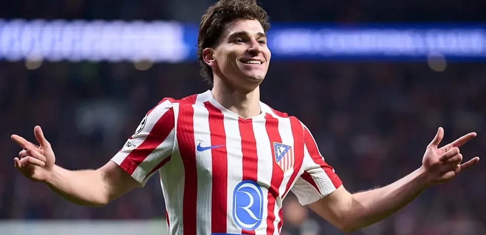 Player celebrating a goal in Atlético Madrid jersey