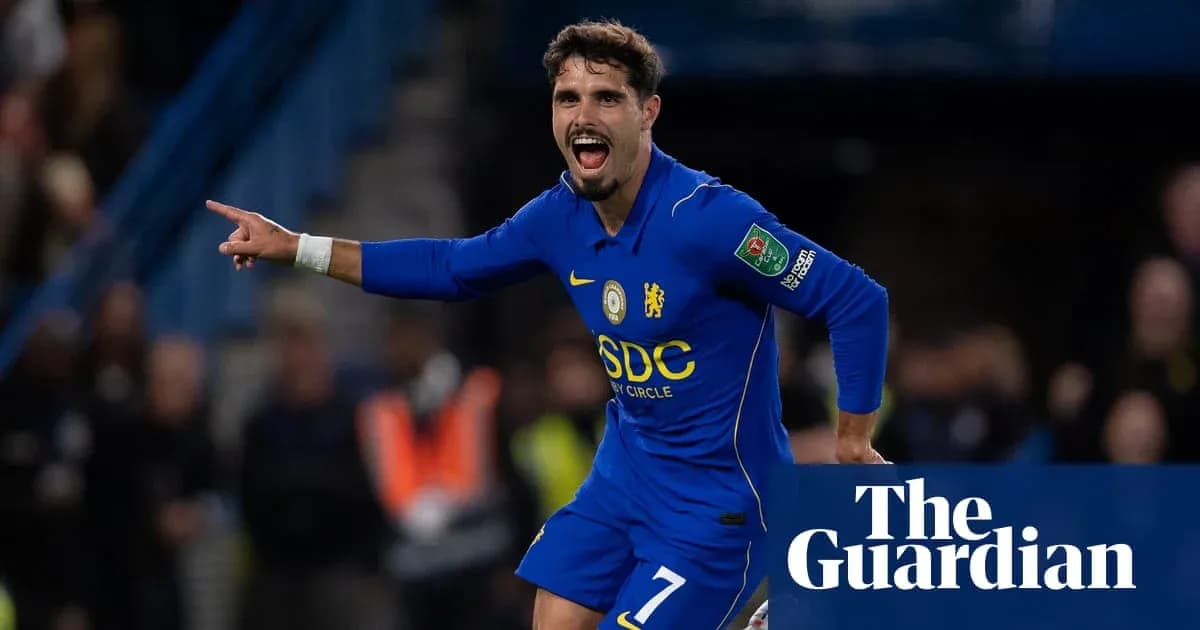 Player celebrating a goal in Chelsea kit