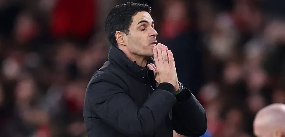Coach gesturing with hands during match