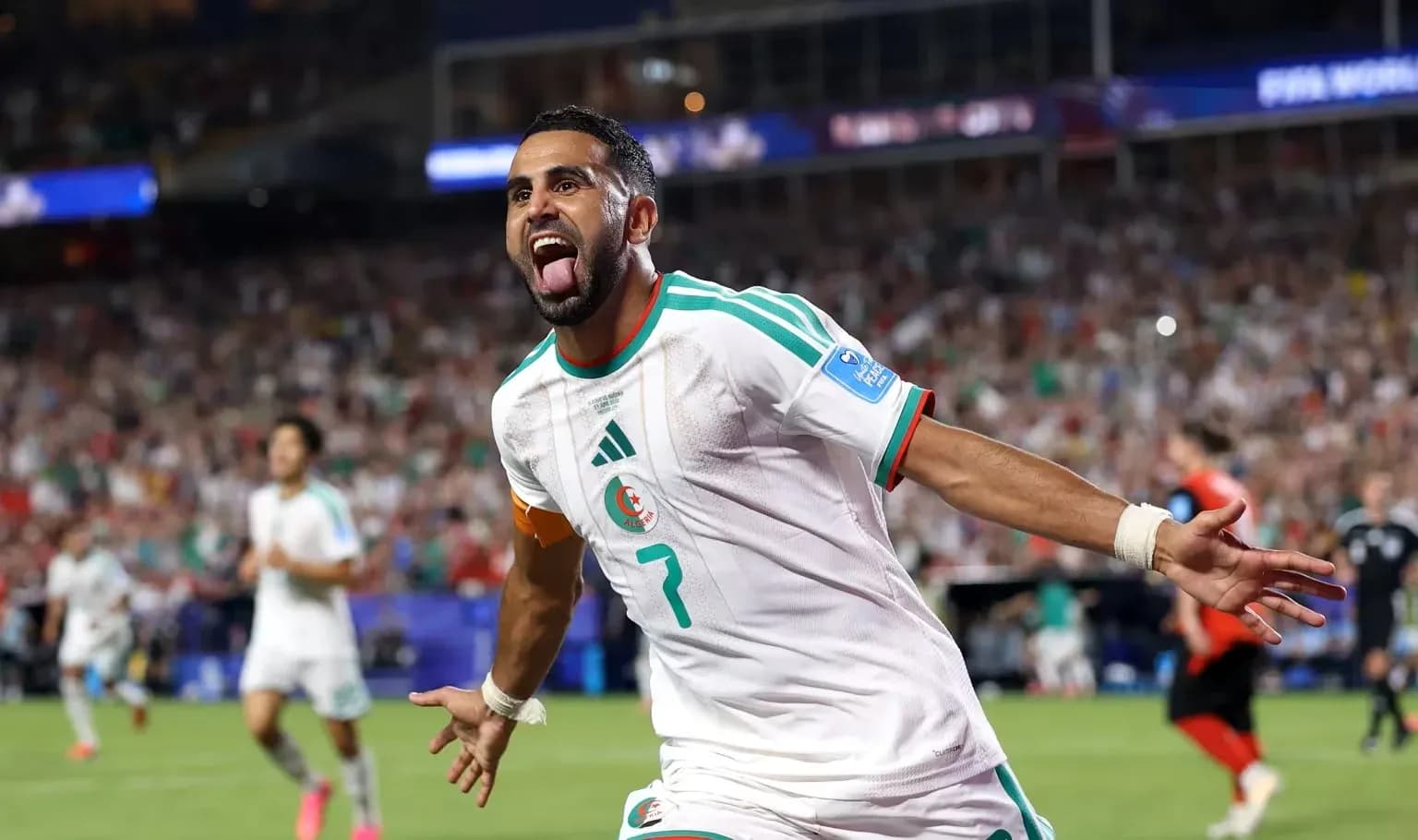Algerian player celebrating goal during match