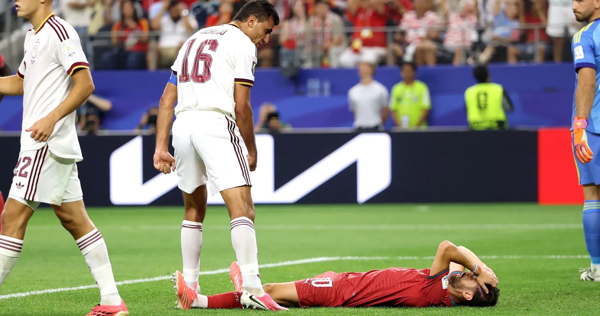 Player lying on the ground after a challenge