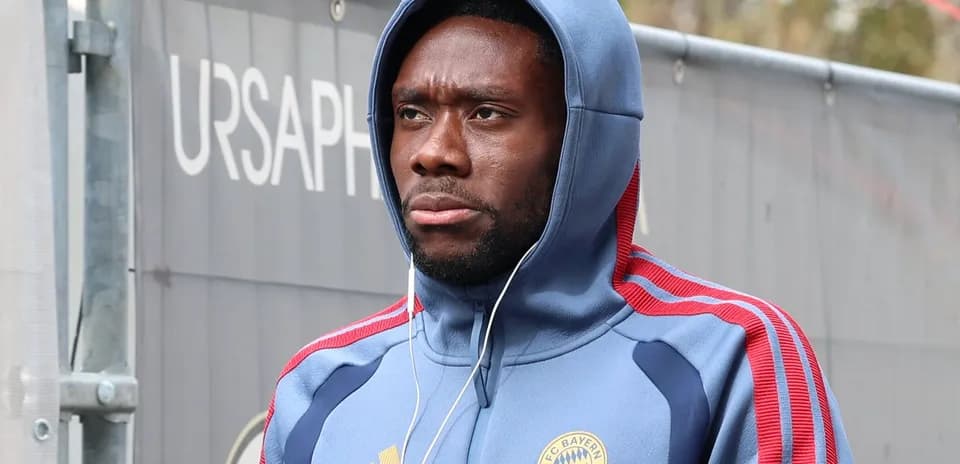 Player wearing Bayern Munich hoodie before training