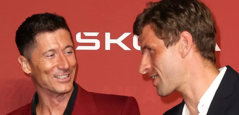 Two men smiling during an awards event