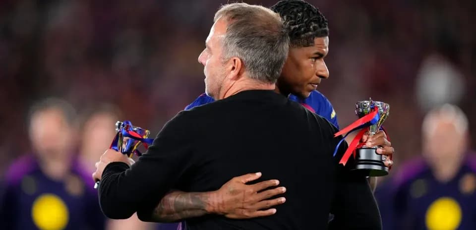 Player receiving award from coach in celebration
