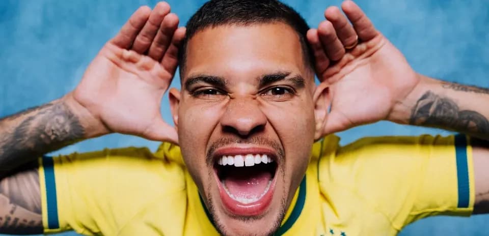 Player in yellow jersey making a playful expression