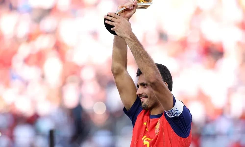 Player celebrating with trophy after victory