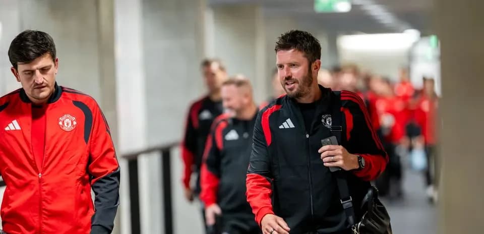 Manchester United team walking in corridor before match