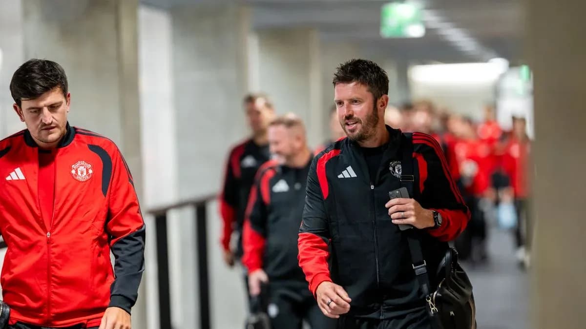 Manchester United team walking in corridor before match