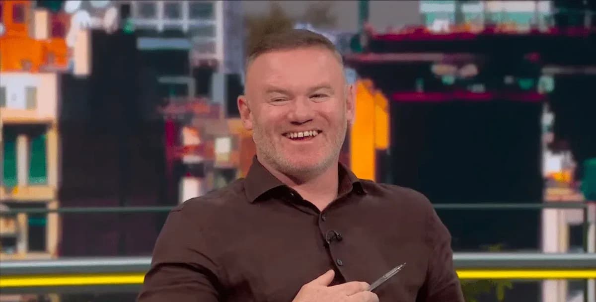 Former player smiling during sports discussion segment
