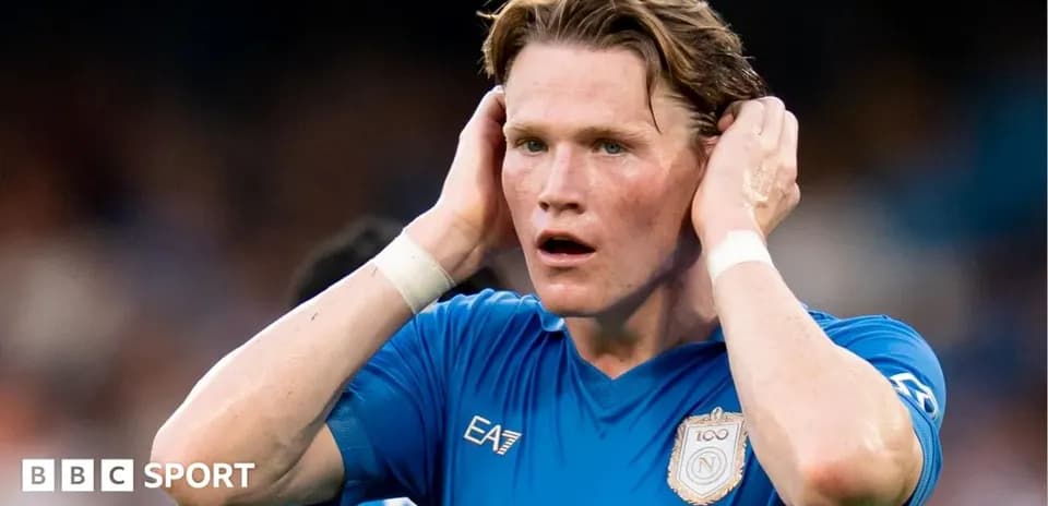 Player reacting during a match wearing blue jersey