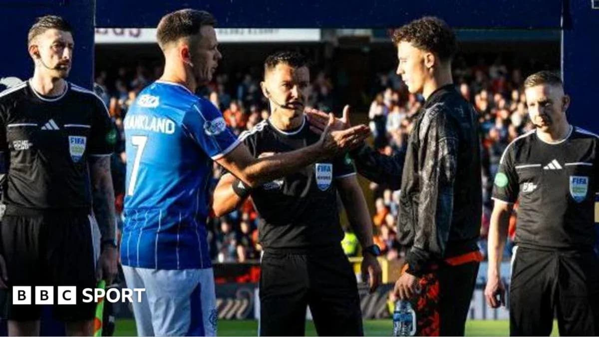 Players and referees shaking hands before match