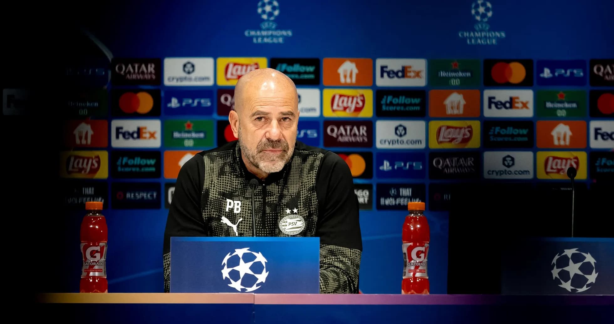 Manager at Champions League press conference podium