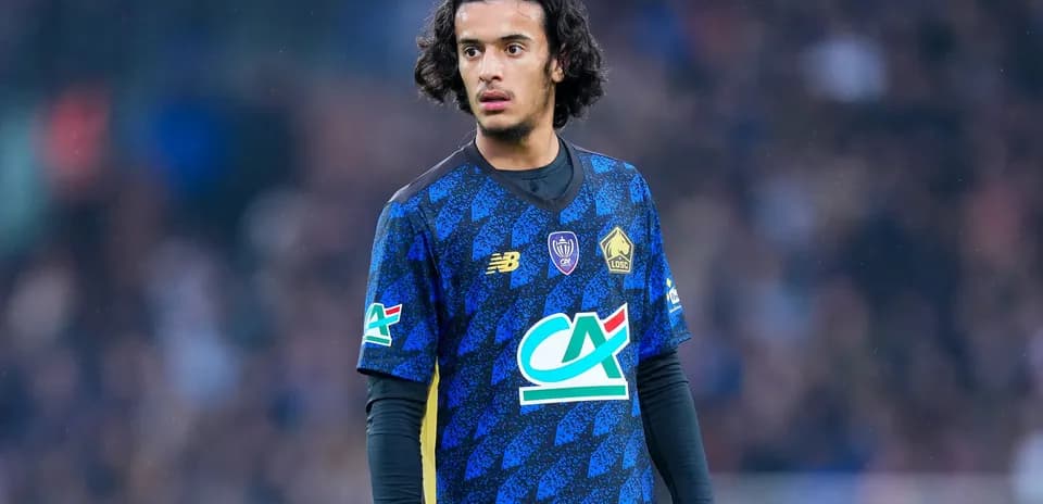 Player wearing blue jersey on the field