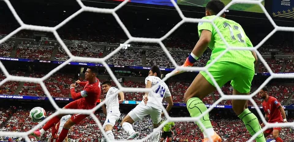 Goalkeeper attempting save during World Cup match