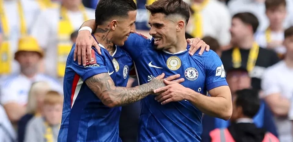 Chelsea players celebrating after scoring a goal