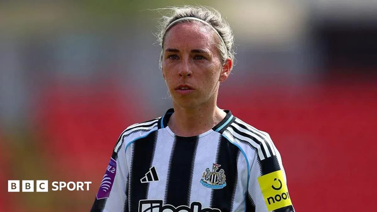 Female player in Newcastle kit during match