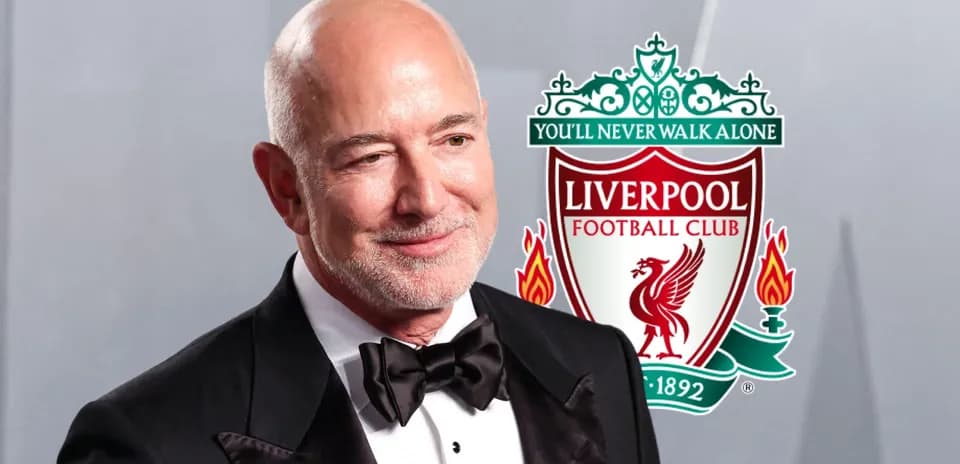 Person in tuxedo with Liverpool FC logo background