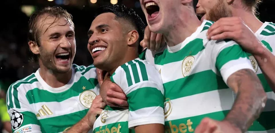 Celtic players celebrating a goal in UEFA match