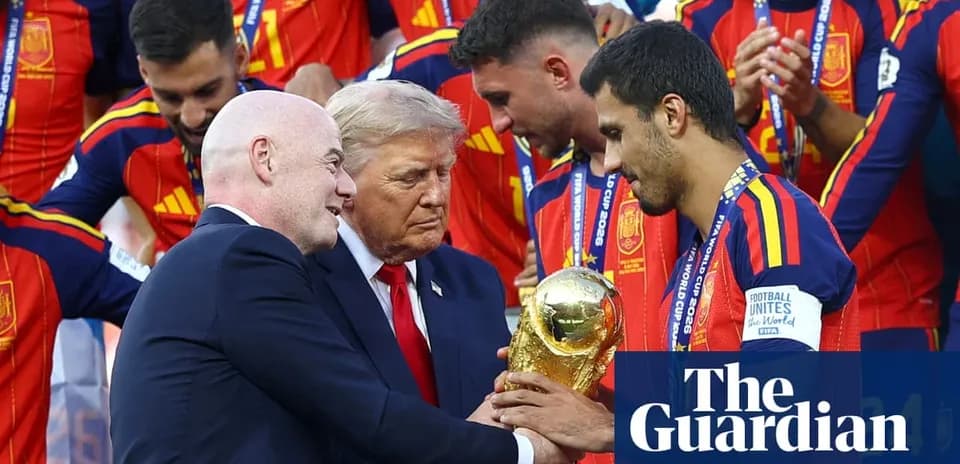 Officials presenting World Cup trophy to Spain team
